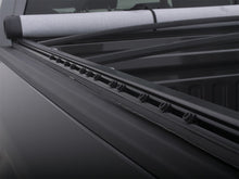 Load image into Gallery viewer, Lund 00-04 Dodge Dakota (5ft. Bed) Genesis Snap Tonneau Cover - Black