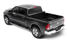 Load image into Gallery viewer, Lund 19-23 RAM 1500 (5.5ft Bed w/o RamBox Cargo Mgmt) Genesis Elite Roll Up Tonneau Cover - Black