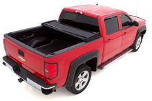 Load image into Gallery viewer, Lund 19-23 Ram 1500 8ft Bed Genesis Elite Tri-Fold Tonneau - Black