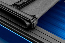 Load image into Gallery viewer, Lund 19-23 RAM 1500 (5.5ft Bed w/o RamBox Cargo Mgmt) Genesis Elite Tri-Fold Tonneau Cover - Black