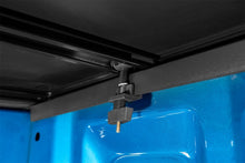 Load image into Gallery viewer, Lund 19-23 RAM 1500 (6.5ft Bed w/o RamBox Cargo Mgmt) Genesis Tri-Fold Tonneau Cover - Black