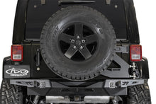 Load image into Gallery viewer, Addictive Desert Designs 07-18 Wrangler JK Stealth Fighter Tire Carrier (Req Stealth Fighter Bumper)